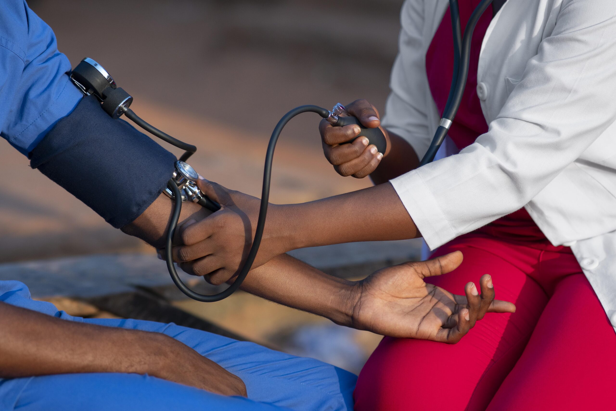 africa humanitarian aid doctor taking care patient 2 scaled